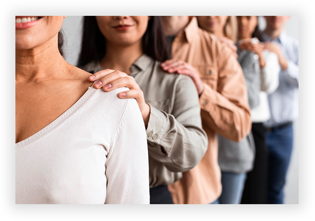 smiley-people-touching-shoulders-group-therapy-session